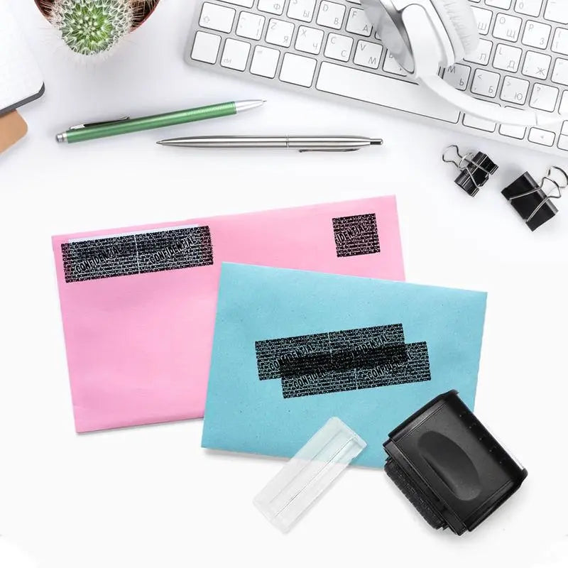 Envelopes with their printed details covered by a privacy pattern
