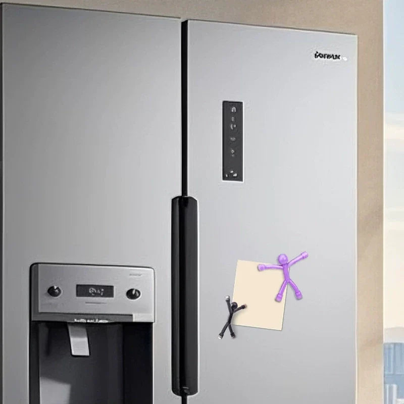 Magnetic figures on a suitable fridge door; display props are not included